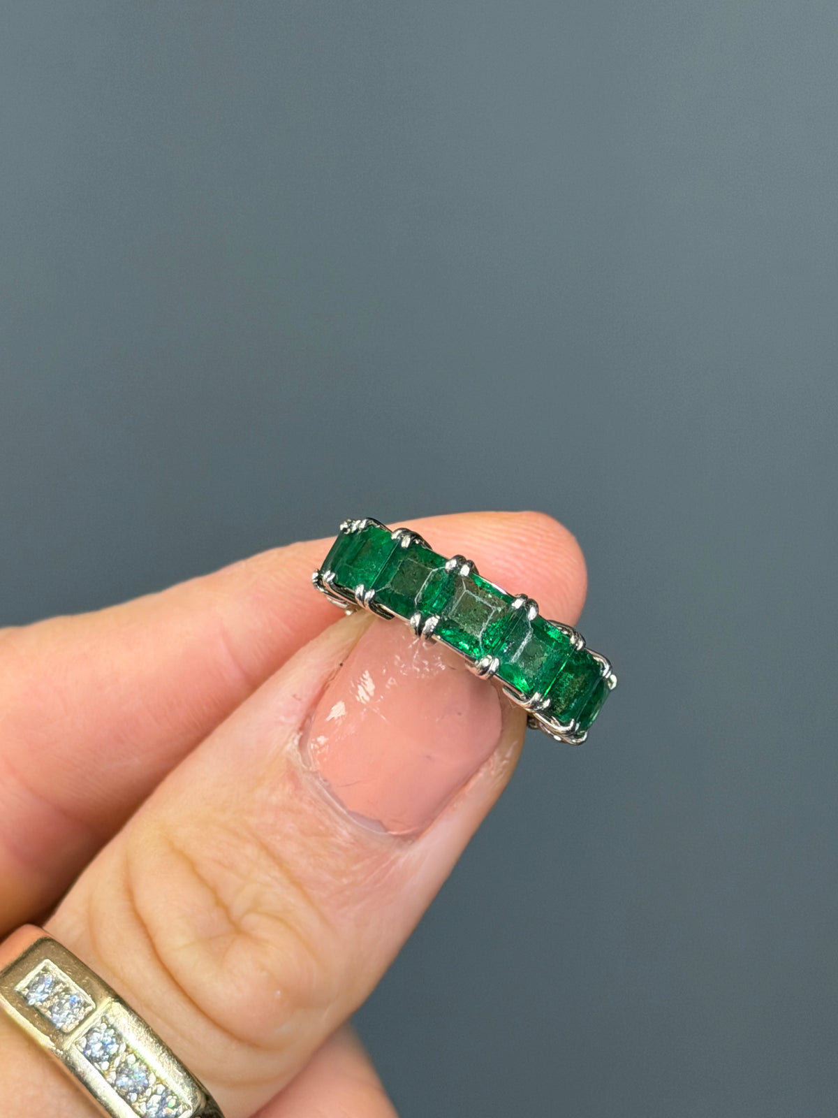The “Mitchell” Natural Emerald Platinum Eternity Band