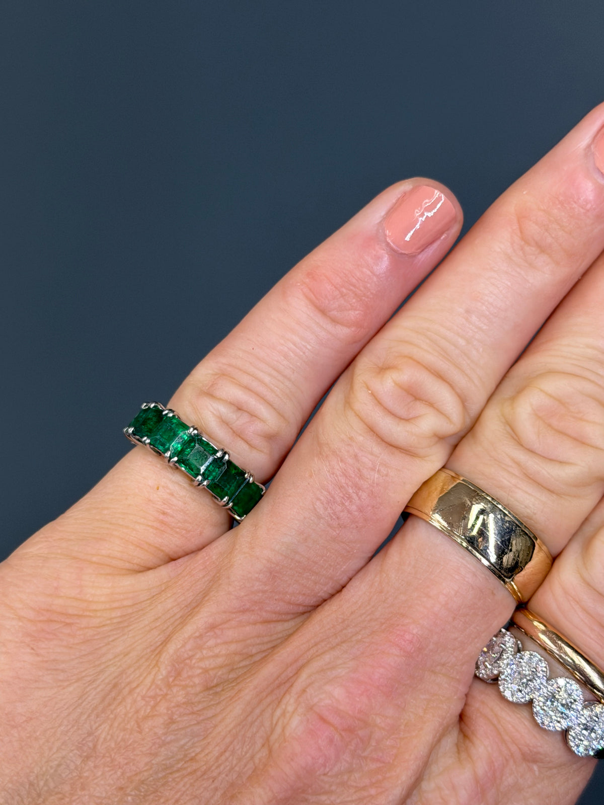 The “Mitchell” Natural Emerald Platinum Eternity Band